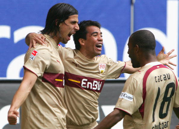 HAMBURG, GERMANY - APRIL 07: Sami Khedira (L) celebrates scoring Stuttgart's second goal with his teammates Pavel Pardo (C) and Cacau during the Bundesliga match between Hamburger SV and VFB Stuttgart at the AOL Arena on April 7, 2007 in Hamburg, Germany. (Photo by Alexander Hassenstein/Bongarts/Getty Images)