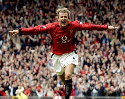 David Beckham celebrates after making it Manchester United 1-Charlton 0 during a Premiership clash at Old Trafford in 2003. Manchester United, overloaded with debt since their takeover by a billionaire American family of investors, is moving to raise cash through a US share sale