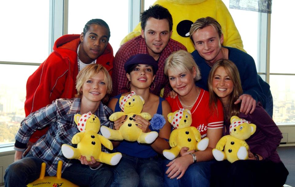 Spearritt (front left) with S Club 7 in 2001 (Getty Images)