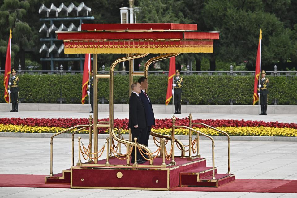 Chinese President Xi Jinping, right, and Russian President Vladimir Putin attend an official welcome ceremony in Beijing, China, on Thursday, May 16, 2024. (Sergei Bobylev, Sputnik, Kremlin Pool Photo via AP)