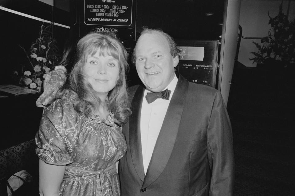 British actors Roy Kinnear (1934 - 1988) and Carmel Cryan attend the premiere of melodrama film 'They Shoot Horses, Don't They?' at the Prince Charles Cinema, Soho, London, UK, 10th July 1970. (Photo by P. Shirley/Daily Express/Hulton Archive/Getty Images)