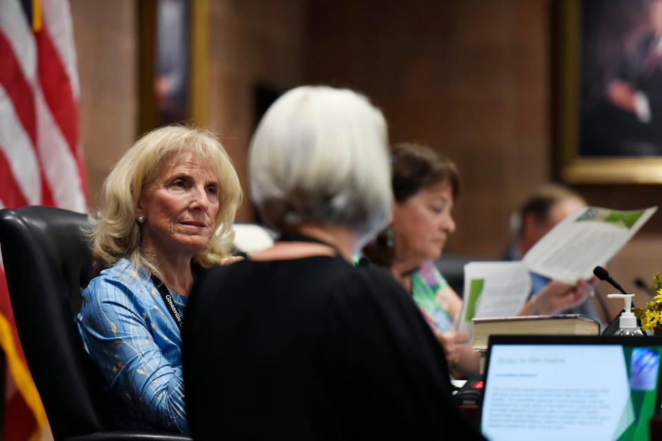 Lynda Leventis-Wells, area 22 trustee, listens on as Tara Dean, executive director of Academic Innovation and Technology speaks during a special board meeting that concluded in banning three books from Greenville County Schools on Tuesday, May 28, 2024.