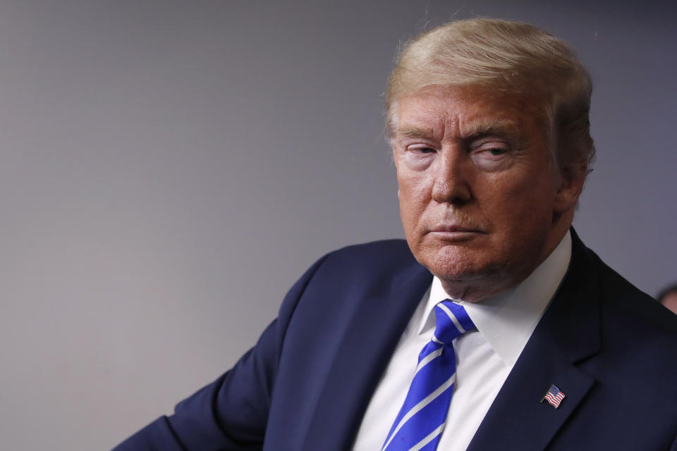 President Donald Trump listens during a briefing about the coronavirus in the James Brady Press Briefing Room of the White House, Thursday, April 23, 2020, in Washington. (AP Photo/Alex Brandon)