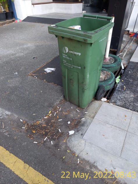 Cigarette butt littering at Tyrwhitt Road next to bin