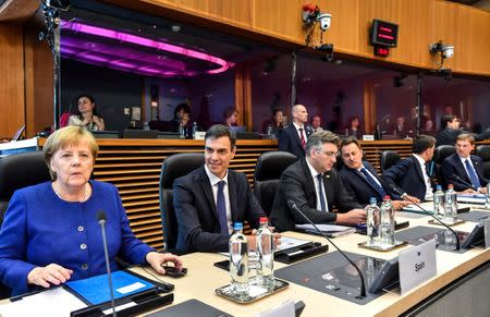 German Chancellor Angela Merkel attends a round table meeting at an informal EU summit on migration at EU headquarters in Brussels, Belgium June 24, 2018. Geert Vanden Wijngaert/Pool via Reuters