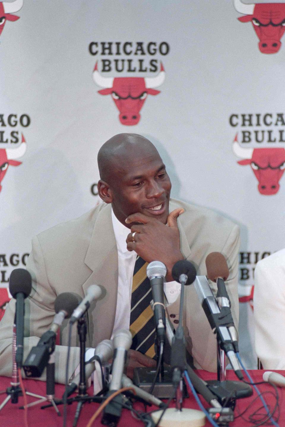 MJ at his retirement press conference. (Eugene Garcia/AFP via Getty Images)