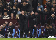 Aston Villa manager Unai Emery, center left, reacts during the English Premier League soccer match between Aston Villa and Liverpool at the Villa Park stadium in Birmingham, England, Monday, May 13, 2024. (Bradley Collyer/PA via AP)