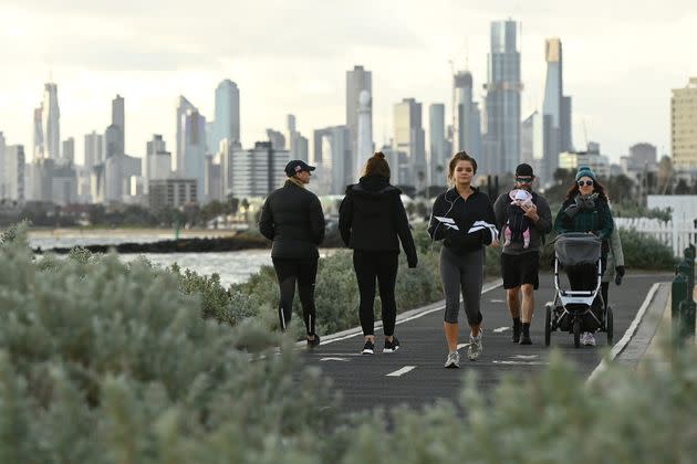 Melburnians exercise along Elwood Beach on July 13, 2020 in Melbourne, Australia. Metropolitan Melbourne and the Mitchell shire are in lockdown following the rise in COVID-19 cases through community transmissions. 