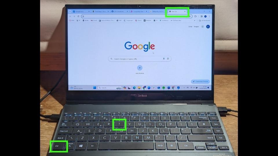  How to switch tabs in a web browser - Photo of a laptop with keys and browser tab highlighted