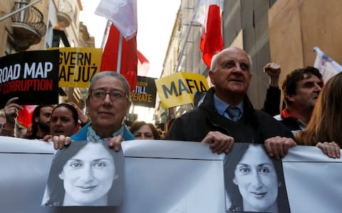 Rose and Michael Vella, the parents of murdered journalist Daphne Caruana Galizia, attend the protest in Valletta, Malta - Credit: Reuters