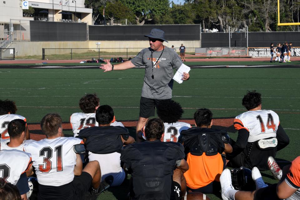 Ventura College head football coach Steve Mooshagian speaks with the players during a team practice on Wednesday, Aug. 31, 2022. The Pirates open their season against rival Moorpark College at home on Saturday night.