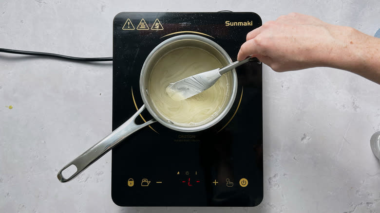 stirring gelatin in pot