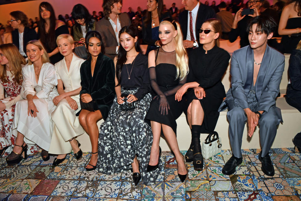 (L-R) British actress Naomi Watts with her daughter Kai, US actress Michelle Williams, US actress Rachel Ziegler, Korean singer Haerin, US actress Anya Taylor-Joy, English actress Rosamund Pike, and Chinese singer Tony Yu attend the Dior pre-fall fashion show at the Brooklyn Museum in Brooklyn, New York on April 15, 2024. (Photo by Andrea RENAULT / AFP) (Photo by ANDREA RENAULT/AFP via Getty Images)