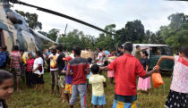 <p>Relief materials are handed out for residents in Ayagama in Ratnapura district, Sri Lanka, Wednesday, May 31, 2017. Sri Lanka’s government says the death toll from mudslides and floods has exceeded 200, with dozens missing. (Sri Lanka Air Force via AP) </p>