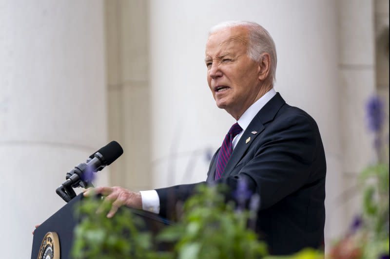 U.S. President Joe Biden speaks Monday at the 156th National Memorial Day Observance Ceremony at Arlington National Cemetery. On Tuesday, the White House and Energy Department will make the announcement with governors, regulators, utilities, labor unions and industry leaders “to explore innovative policy solutions to unlock the deployment of modern grid technologies and share best practices." Photo by Bonnie Cash/UPI