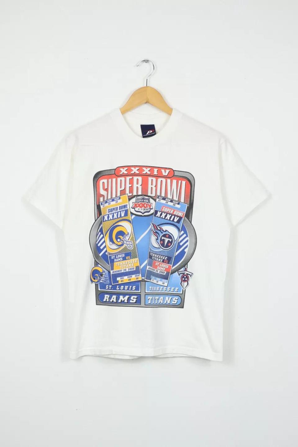 <p><a href="https://go.redirectingat.com?id=74968X1596630&url=https%3A%2F%2Fwww.urbanoutfitters.com%2Fshop%2Fvintage-2000-super-bowl-xxxiv-tee&sref=https%3A%2F%2Fwww.thepioneerwoman.com%2Fholidays-celebrations%2Fgifts%2Fg41589500%2Ffootball-gifts%2F" rel="nofollow noopener" target="_blank" data-ylk="slk:Shop Now;elm:context_link;itc:0;sec:content-canvas" class="link ">Shop Now</a></p><p>Vintage 2000 Super Bowl XXXIV Tee</p><p>urbanoutfitters.com</p><p>$84.00</p><span class="copyright">Urban Outfitters </span>