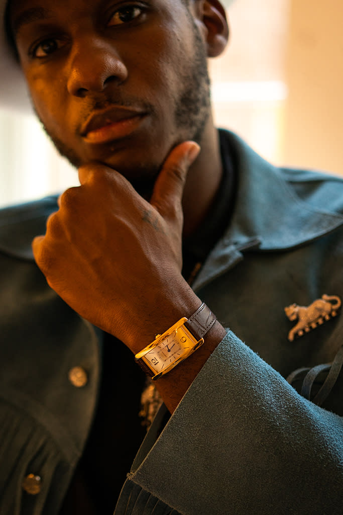 Leon Bridges wearing a watch and jewelry by Cartier. - Credit: Courtesy of Eric Lagg