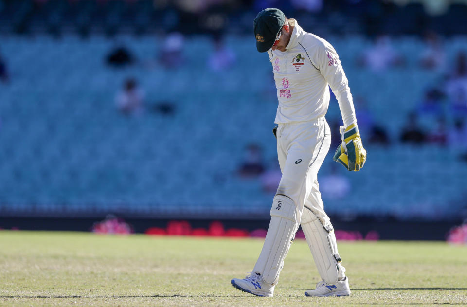 Australian captain Tim Paine reacts during play on the final day of the third cricket test between India and Australia at the Sydney Cricket Ground, Sydney, Australia, Monday, Jan. 11, 2021. (AP Photo/Rick Rycroft)