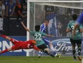 Chelsea's Fernando Torres (C rear) scores a goal against Schalke 04 during their Champions League soccer match in Gelsenkirchen October 22, 2013. REUTERS/Wolfgang Rattay (GERMANY - Tags: SPORT SOCCER)
