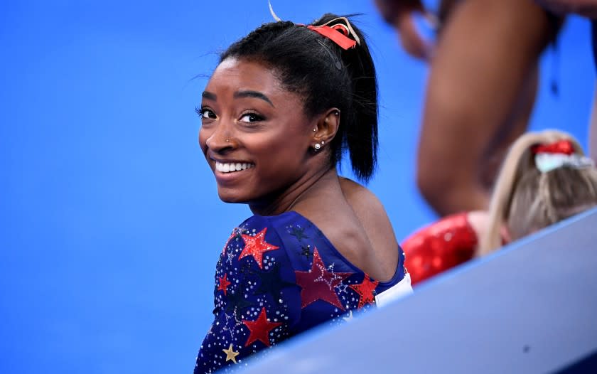 -TOKYO,JAPAN July 24, 2021: USA's Simone Biles smiles in between sessions in the women's team qualifying at the 2020 Tokyo Olympics. (Wally Skalij /Los Angeles Times)