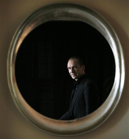 British actor Ralph Fiennes poses for a portrait in Beverly Hills, California, December 4, 2013. REUTERS/Lucy Nicholson