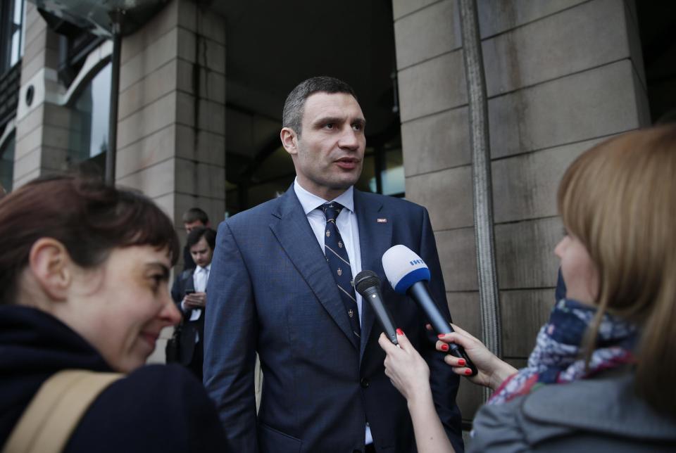 Vitali Klitschko, leader of Ukraine's UDAR party, talks to members of the media after meetings with British parliamentarians in central London, Wednesday, March 26, 2014. (AP Photo/Lefteris Pitarakis)