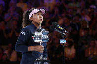 Tennis - Australian Open - Women's Singles Final - Melbourne Park, Melbourne, Australia, January 26, 2019. Japan's Naomi Osaka gives a speech after winning her match against Czech Republic's Petra Kvitova. REUTERS/Adnan Abidi