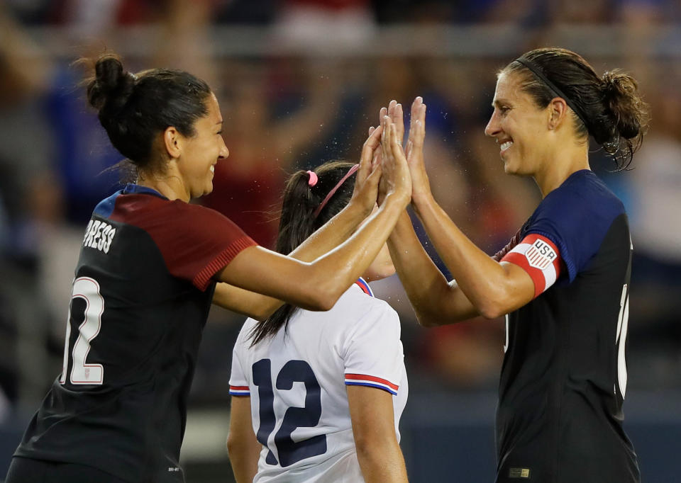 Christen Press and Carli Lloyd