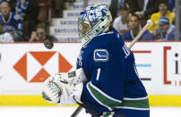 VANCOUVER, CANADA - MARCH 14: Goalie Roberto Luongo #1 of the Vancouver Canucks juggles the puck after making a save against the Phoenix Coyotes during the first period in NHL action on March 14, 2012 at Rogers Arena in Vancouver, British Columbia, Canada. (Photo by Rich Lam/Getty Images)