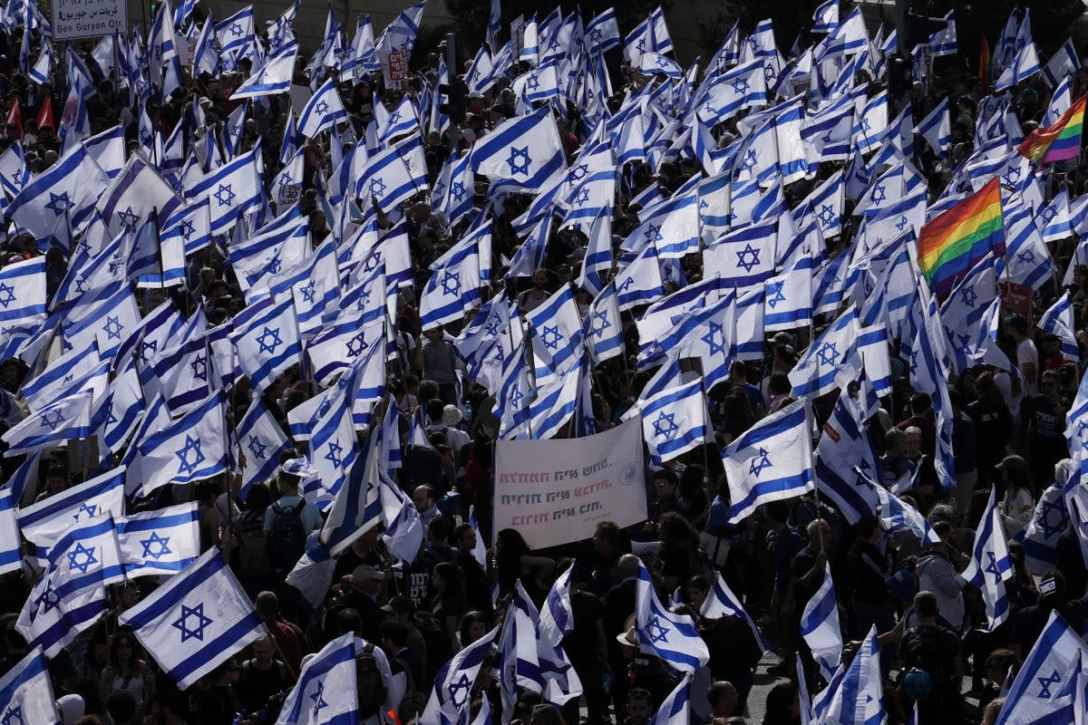 Israelis protest against Benjamin Netanyahu's judicial overhaul plan earlier this week  (AP)