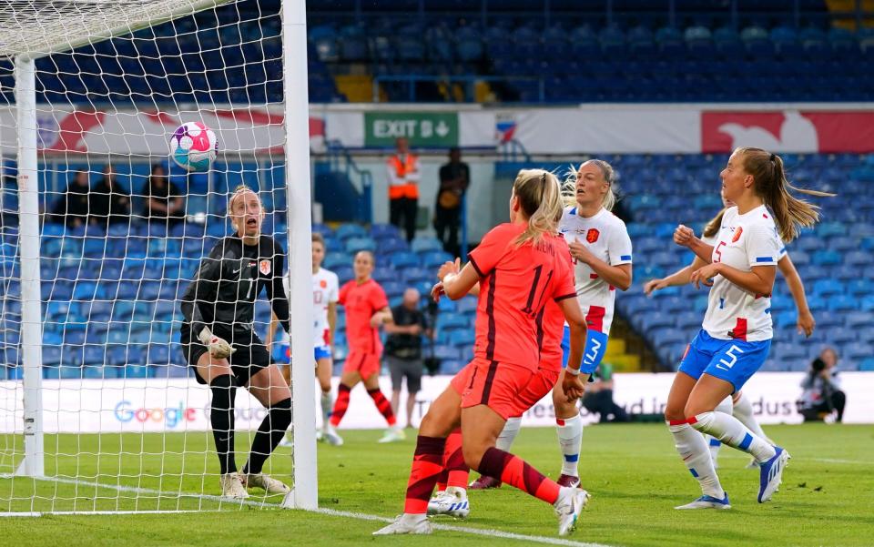Lucy Bronze scores England first goal, chipping Sari van Veenendaal - Free-scoring England put five past defending champions Holland in Women's Euros warm-up -  PA