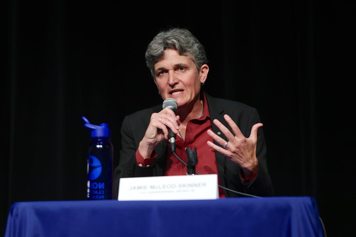 FILE - Democrat Jamie McLeod-Skinner speaks at a candidates debate at Lakeridge High School in Lake Oswego, Ore., Monday, Oct. 17, 2022. McLeod-Skinner is seeking election to Oregon's 5th Congressional District in the Nov. 8, 2022 election. (AP Photo/Steve Dipaola, File)