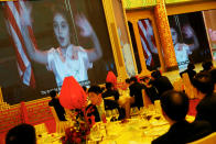 <p>Arabella Kushner, granddaughter of President Donald Trump, sings traditional Chinese songs in a video as part of Trump’s toast as China’s President Xi Jinping hosts a state dinner at the Great Hall of the People in Beijing, China, Nov. 9, 2017. (Photo: Jonathan Ernst/Reuters) </p>