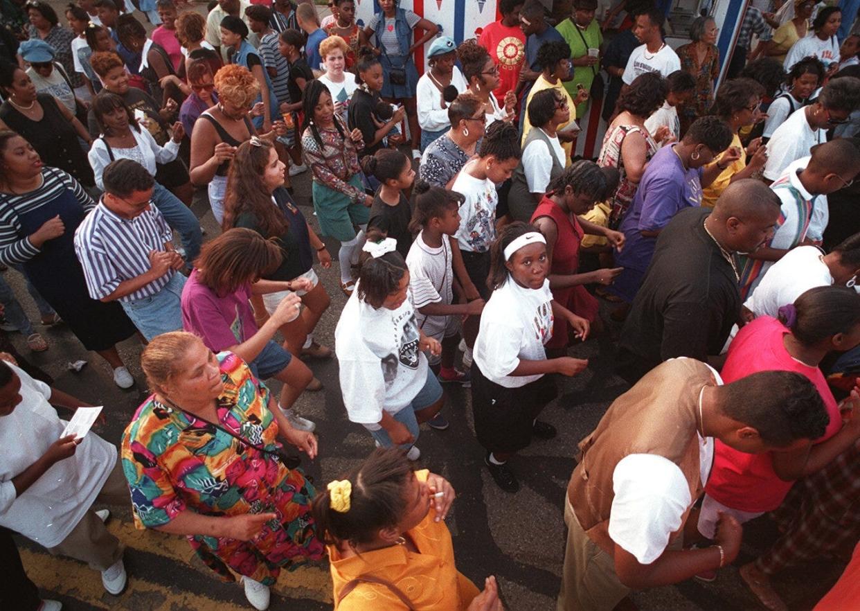 July 7, 1995; Columbus, Ohio; Line dancers doing the "Electric Slide" at the "Comin' Home" celebration on Mt. Vernon Avenue, July 7, 1995. Inspired by the past event, the first-ever Black Columbus Family Reunion will take place at Franklin Park Saturday and Sunday.