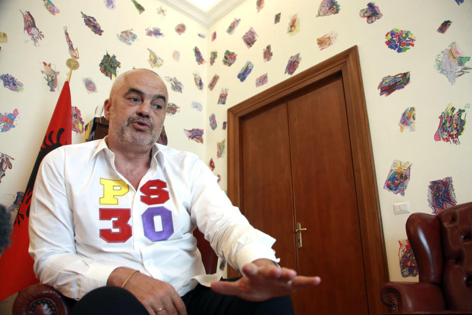 Albanian prime minister Edi Rama speaks during an interview to the Associated Press in Tirana, Friday, June 21, 2019. Rama says the opposition's main goal is to disrupt the country's efforts to launch full membership negotiations with the European Union. (AP Photo/Hektor Pustina)