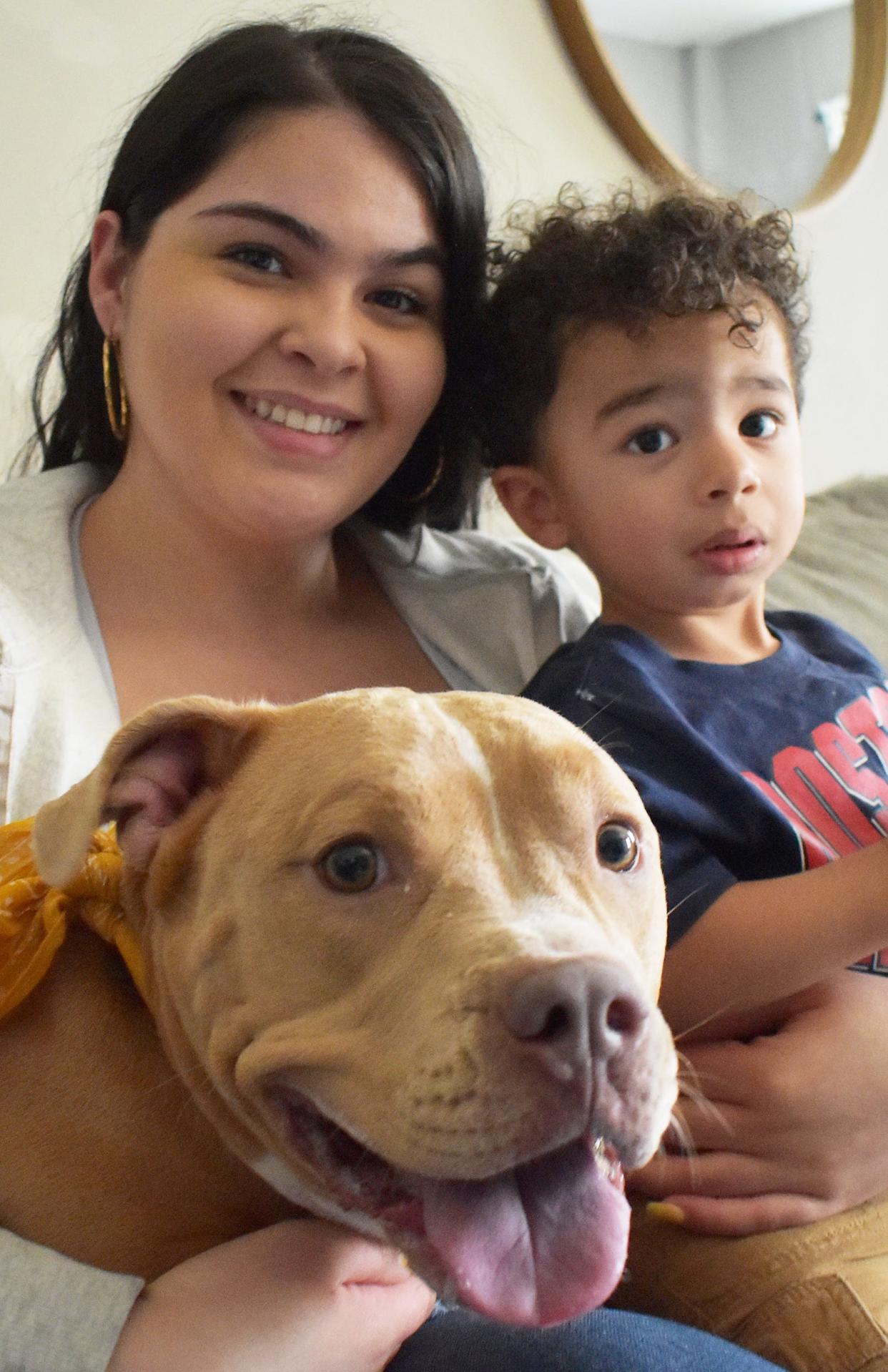 Linoshka Acevedo and her son, Leo, with Honey.