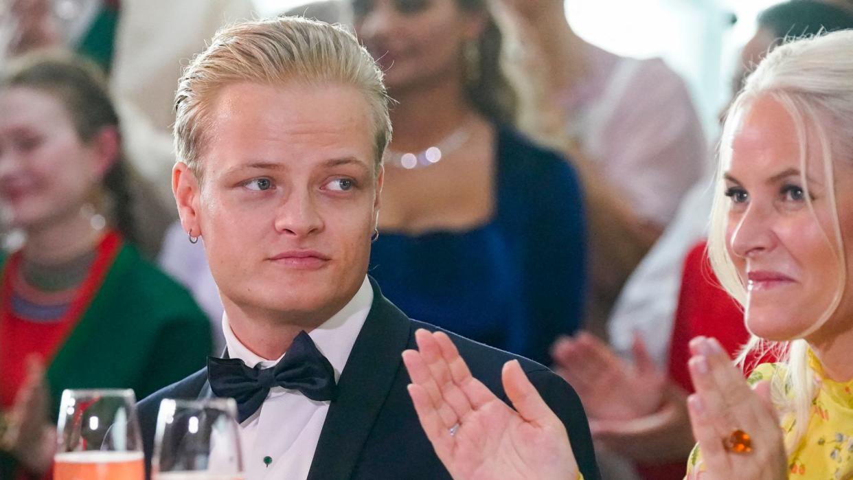 Marius Borg Hoiby sitting next to his mother Norwegian Crown Princess Mette-Marit