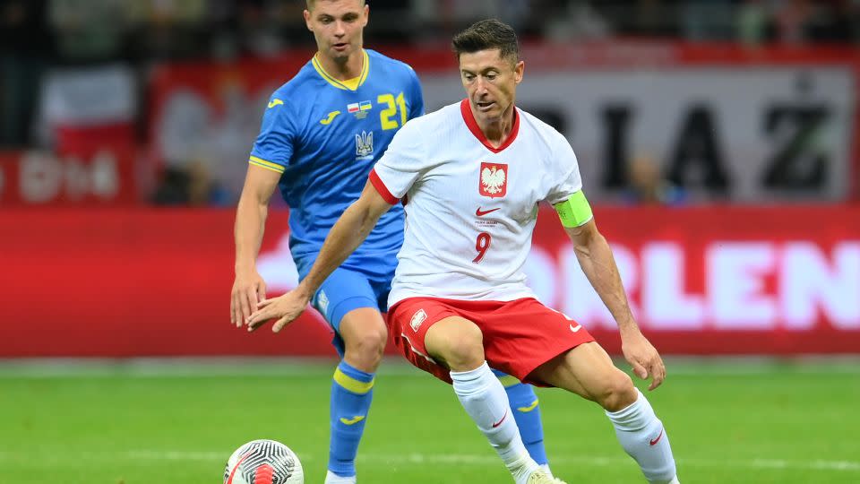 Lewandowski is challenged by Valeriy Bondar during the international friendly match between Poland and Ukraine at Stadion Narodowy on June 07, 2024 in Warsaw, Poland. - Adam Nurkiewicz/Getty Images Europe/Getty Images