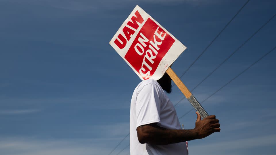 A "UAW On Strike" sign held on a picket line outside the General Motors Ypsilanti Processing Center in Ypsilanti, Michigan, on Friday, September 22. - Emily Elconin/Bloomberg/Getty Images