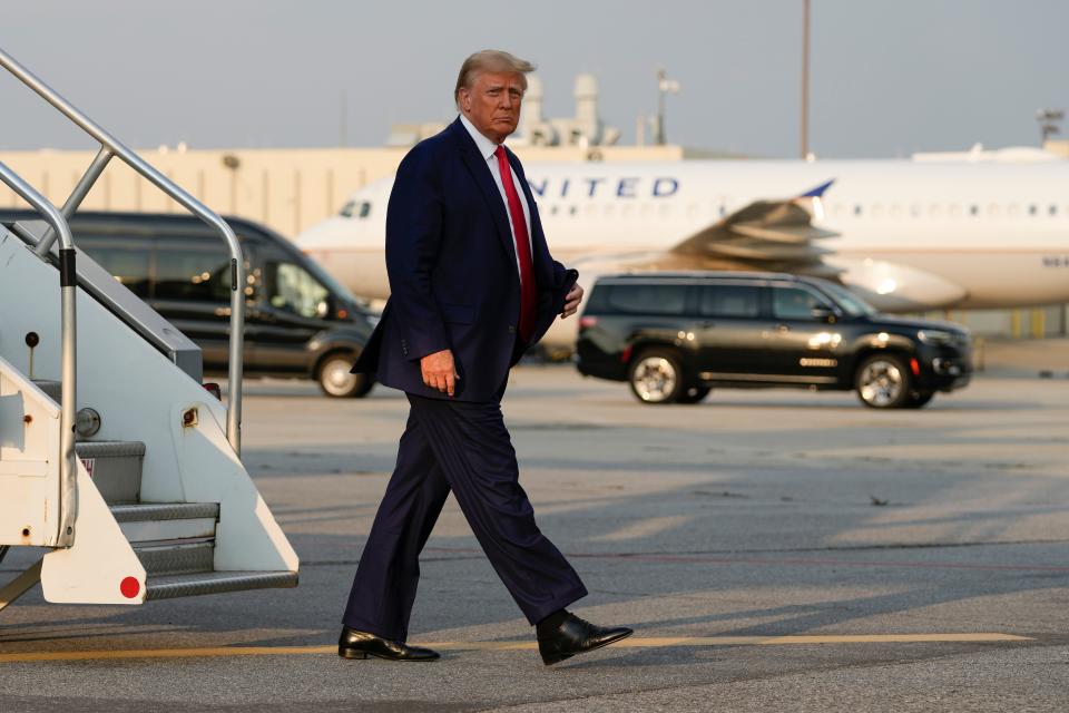 August 24, 2023: Former President Donald Trump steps off his plane as he arrives at Hartsfield-Jackson Atlanta International Airport, in Atlanta.