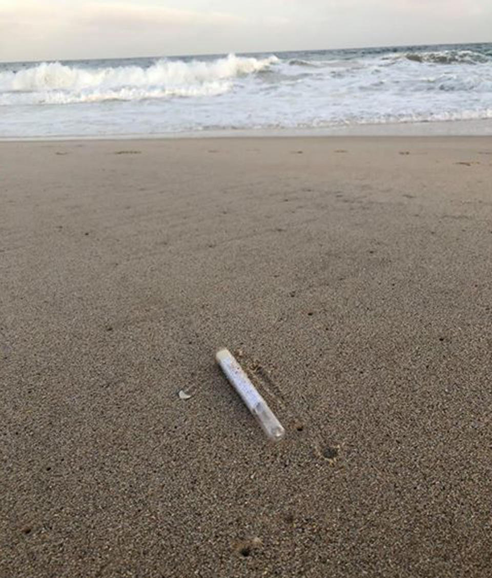 The couple stumbled across this message in a test tube along North Entrance beach. Source: Laura Barnard