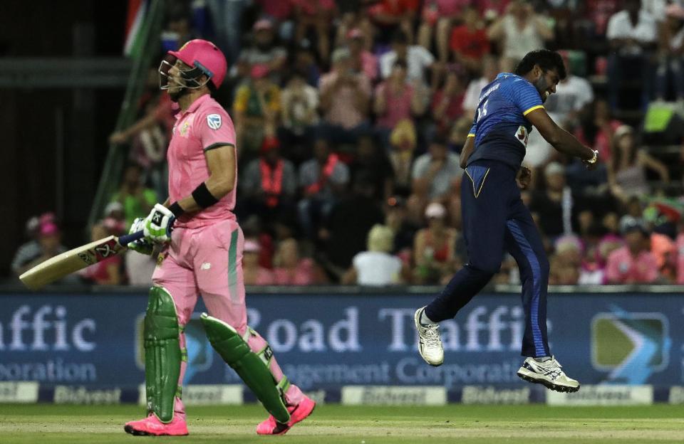 Sri Lanka's bowler Lahiru Madushanka, right, celebrates after dismissing South Africa's batsman Faf du Plessis, for 24 runs during the 3rd One Day International cricket match between South Africa and Sri Lanka, at the Wanderers stadium in Johannesburg, South Africa, Saturday, Feb. 4, 2017. (AP Photo/Themba Hadebe)