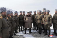 This undated photo provided on Wednesday, Dec. 4, 2019, by the North Korean government shows North Korean leader Kim Jong Un, center, speaks to lieutenants during his visit to Mount Paektu, North Korea. North Korea says leader Kim has taken a second ride on a white horse to a sacred mountain in less than two months. Independent journalists were not given access to cover the event depicted in this image distributed by the North Korean government. The content of this image is as provided and cannot be independently verified. Korean language watermark on image as provided by source reads: "KCNA" which is the abbreviation for Korean Central News Agency. (Korean Central News Agency/Korea News Service via AP)