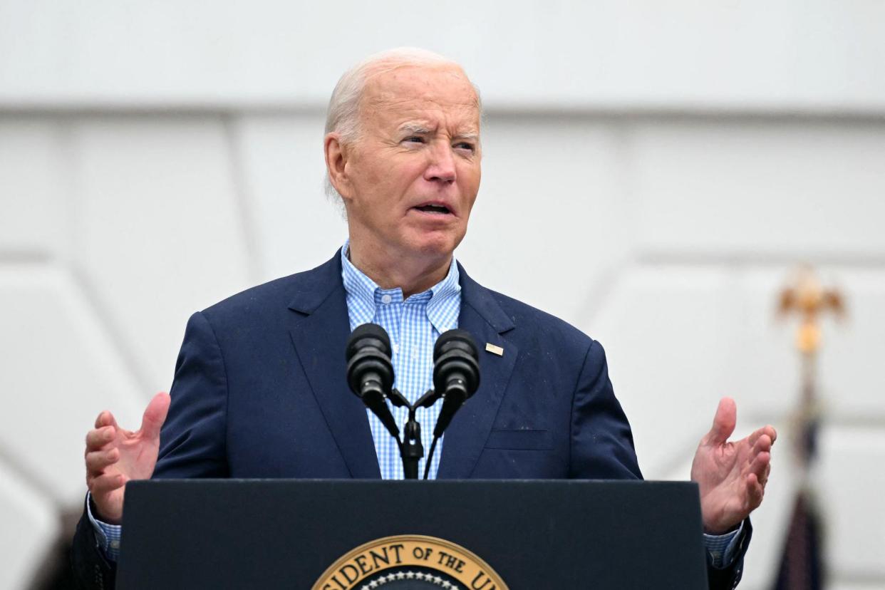 <span>Joe Biden speaks outside the White House on 4 July 2024.</span><span>Photograph: Mandel Ngan/AFP/Getty Images</span>