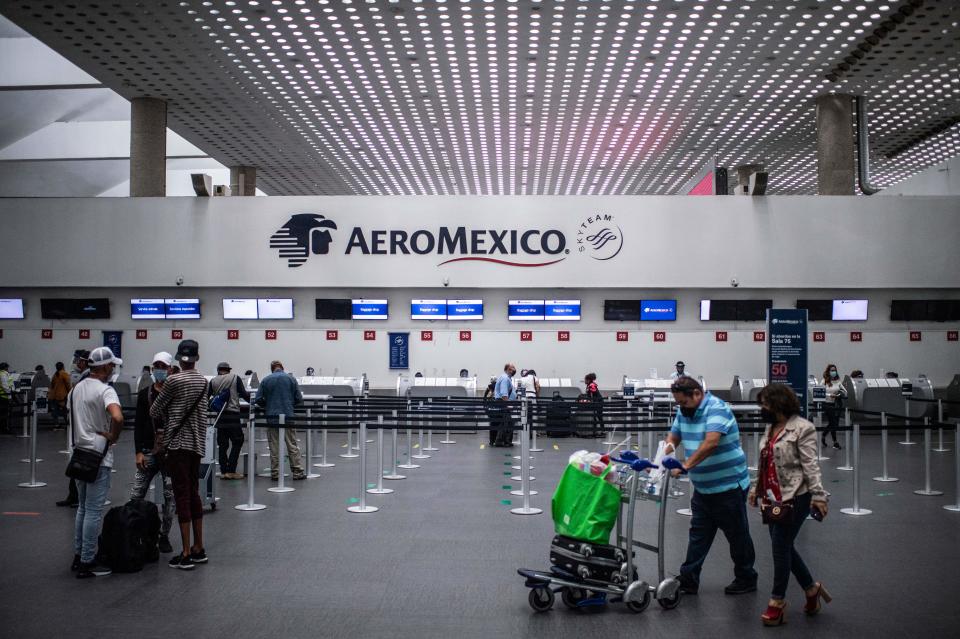 Zona de facturación de Aeromexico en el Aeropuerto Internacional Benito Juarez de la Ciudad de México. Foto: PEDRO PARDO/AFP via Getty Images. 