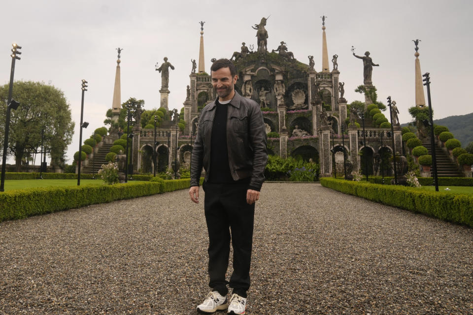 France's designer Nicolas Ghesquiere smiles at the end of the women's Louis Vuitton Cruise 2024 collection, unveiled on Isola Bella (Bella Island) on Lake Maggiore in Stresa, northern Italy, Wednesday, May 24, 2023. (AP Photo/Antonio Calanni)