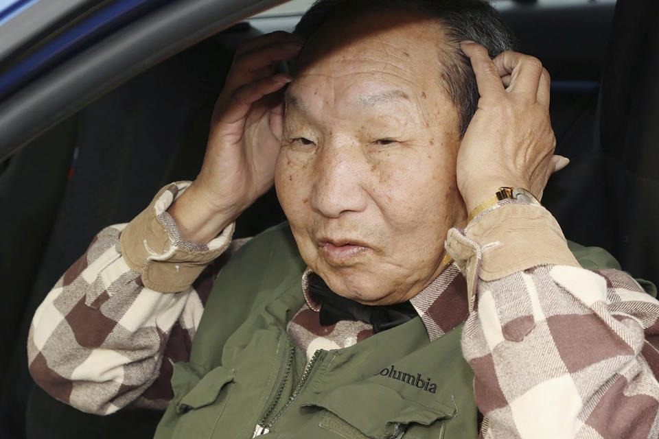 Iwao Hakamada answers to reporters' questions after a walk in Hamamatsu, Shizuoka prefecture, central Japan Monday, March 13, 2023. Tokyo’s high court on Monday ordered a retrial for Hakamada, 87-year-old former boxer who has been on death row for nearly six decades after his murder conviction that his lawyers said was based on forced confession and fabricated evidence. (Kyodo News via AP)