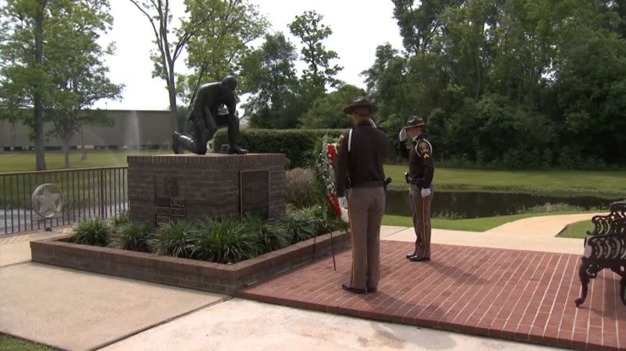 Deputies honoring the law enforcement professionals who lost their lives in the line of duty at the Baldwin County Sheriff’s Office’s annual Law Enforcement Memorial. (News 5 photo)