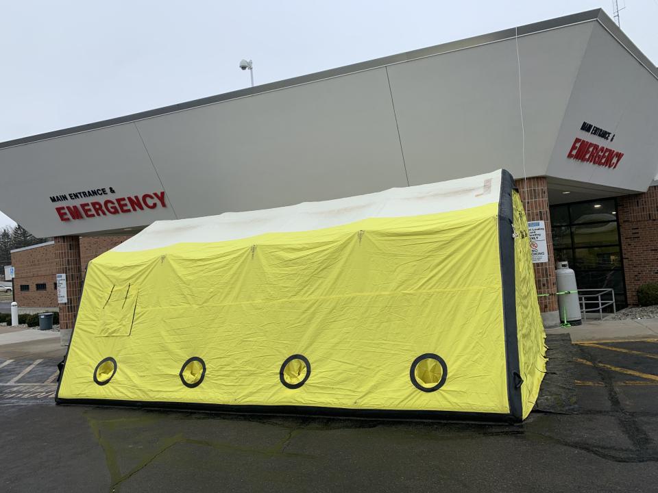 A yellow tent outside Hillsdale Hospital was erected as the hospital dealt with climbing COVID-19 numbers.