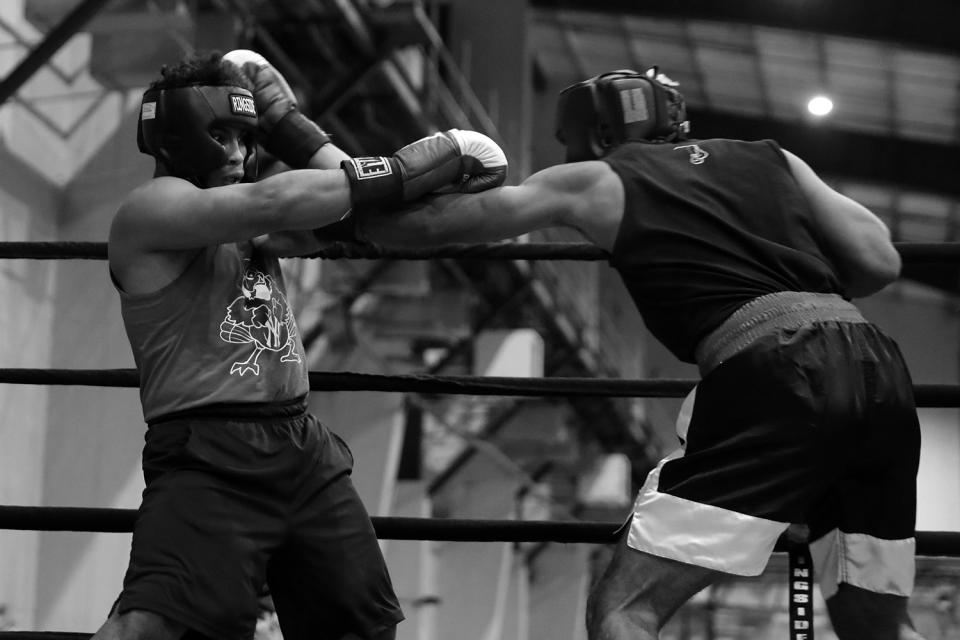 <p>Greg Hamilton gets a wake-up call punch from Andrew Freeman in a heavy bout during the “Bronx Tough Turkey Tussle” at the New York Expo Center in the Bronx, New York, on Nov. 16, 2017. (Photo: Gordon Donovan/Yahoo News) </p>